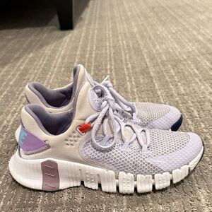 Nike Women's Sneakers in Lavender and White